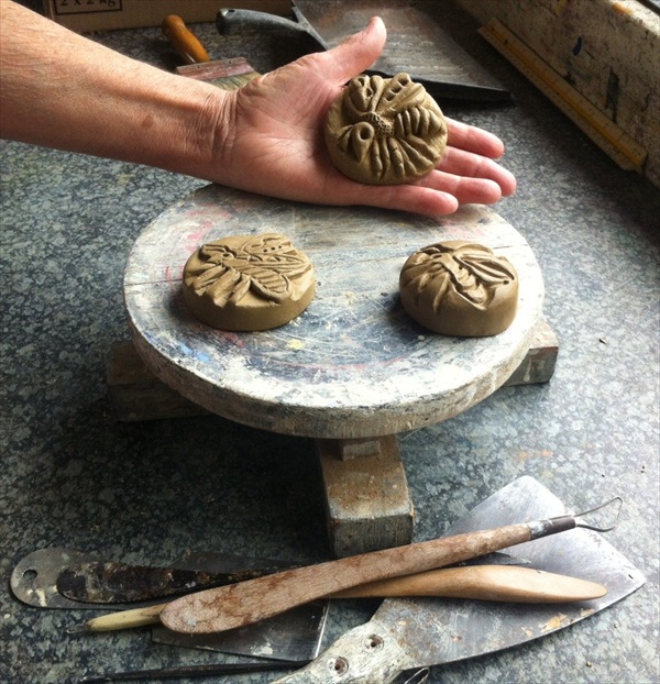 the starting point of the Botanique Massage Bar. A hand carved "bee" out of clay 